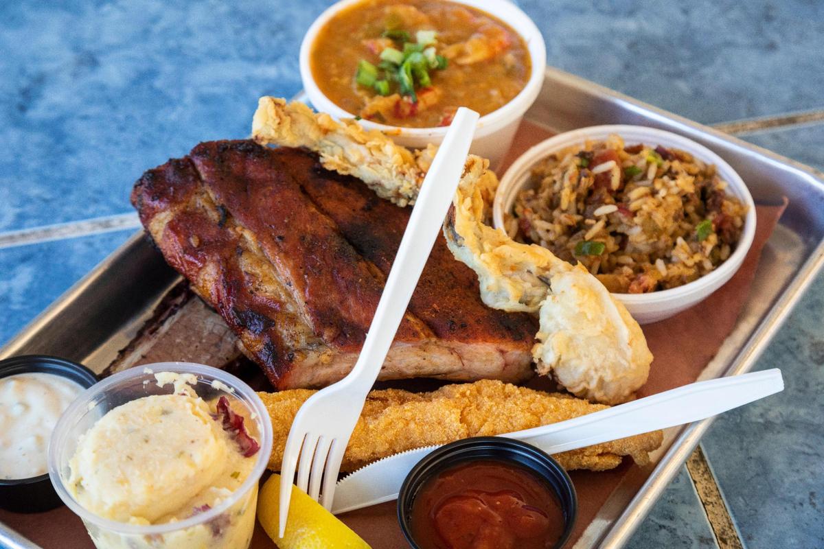 The Pick 5, with brisket, ribs, catfish, frog legs and shrimp etouffee from Proud Mary BBQ.