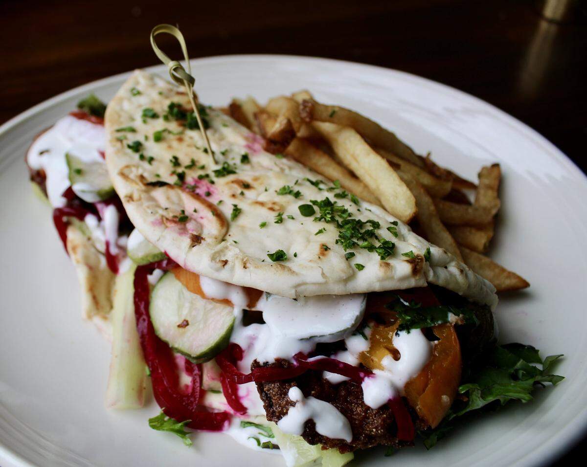 Wallace Station will offer crispy chicken Tawook rolled in scratch made pita with Toum garlic spread, shredded lettuce, house pickled turnips, tomato and pickles.