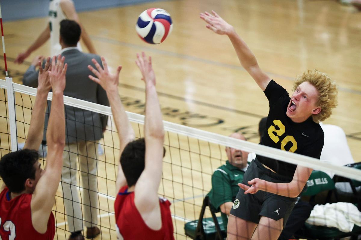 St. Xavier’s Briley Codey spikes the ball against Lafayette during the KVCA boys volleyball semifinals at Western Hills High School in Frankfort on Thursday.