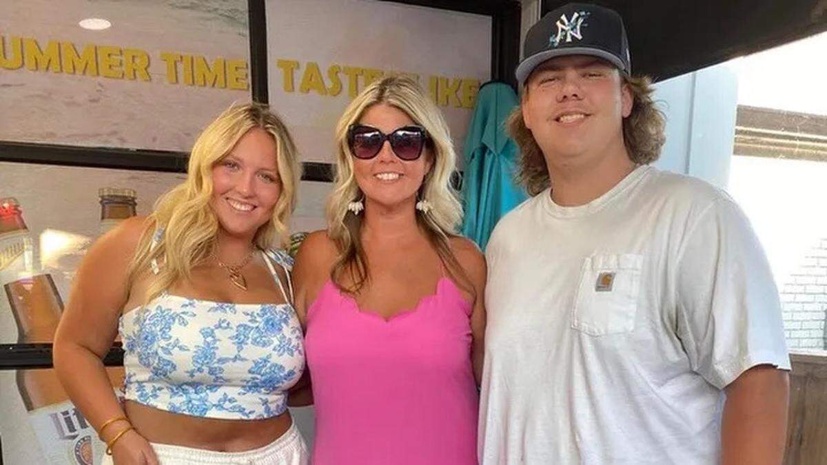 Melissa “Missy” Parrett poses with her family in an undated photo. The 44-year-old mother from Florence, Ky., was killed during a mass shooting July 6, 2024.