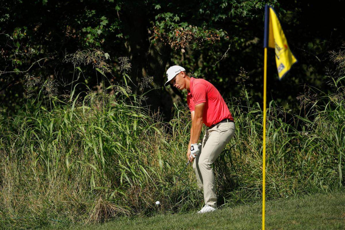 Matti Schmid tries to get his ball out of the bushes on hole 14 during the fourth round of the Barbasol Championship at Keene Trace Golf Club in Nicholasville, Ky., Sunday, July 10, 2022.