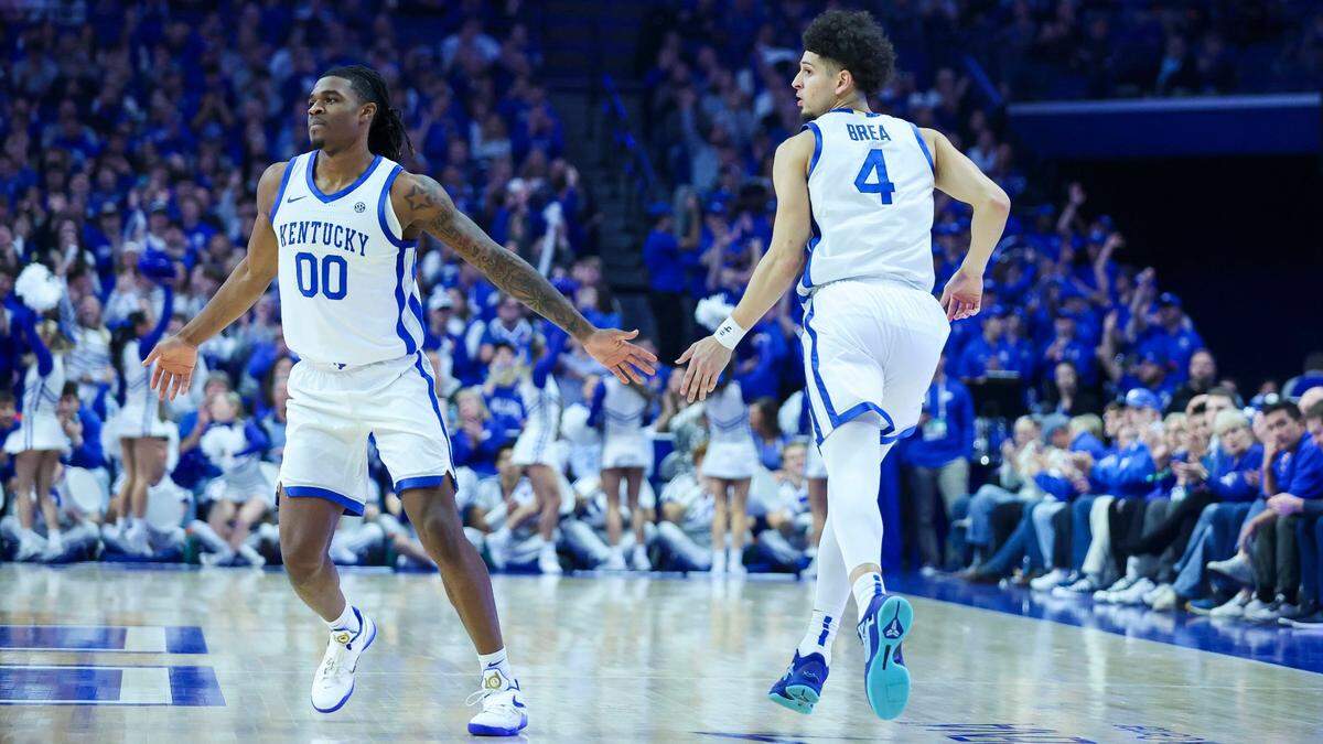 Kentucky guard Koby Brea (4) celebrates with Kentucky guard Otega Oweh after Brea made a 3-pointer during UK’s home win over Colgate. “Our guys have been, from day one, proactive and have been great brothers to one another,” UK assistant coach Alvin Brooks III said.