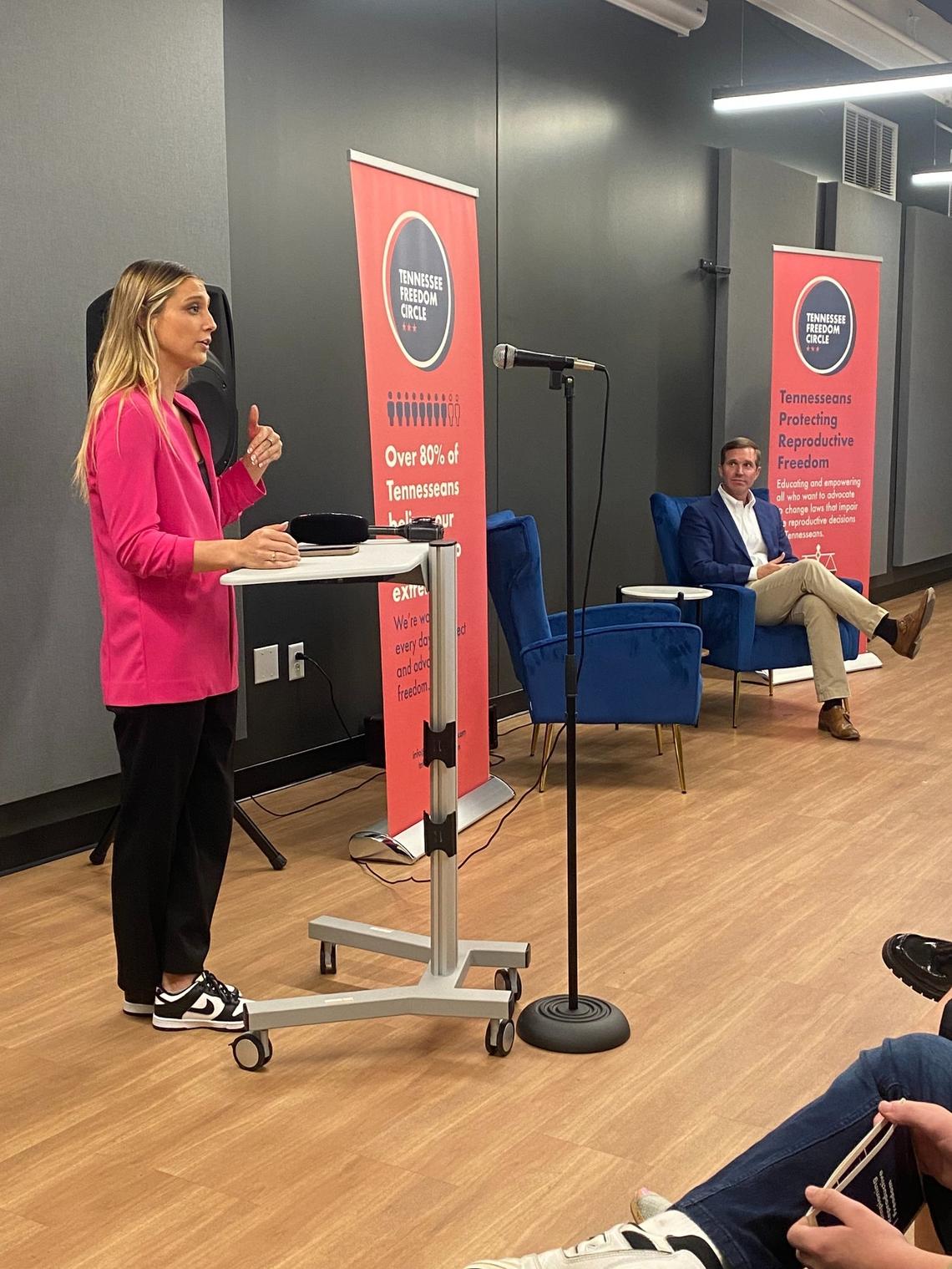 Hadley Duvall and Kentucky Gov. Andy Beshear address an audience of donors at a Tennessee Freedom Circle event in Nashville on Friday. The Tennessee Freedom Circle is a reproductive rights group formed after the fall of Roe v. Wade in 2022.