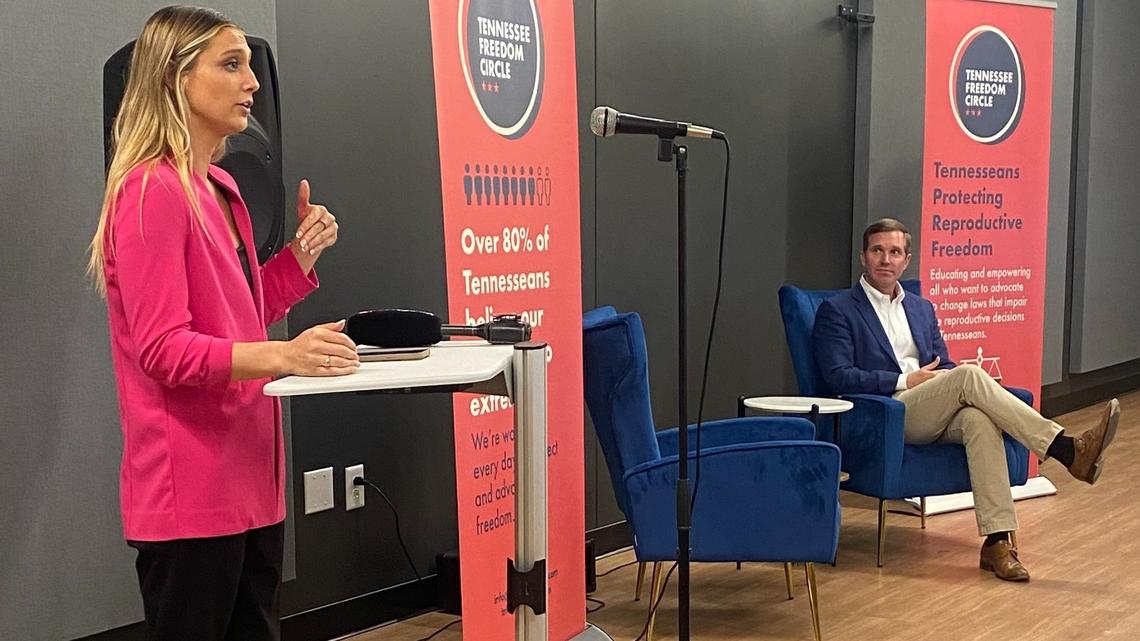 Hadley Duvall and Kentucky Gov. Andy Beshear address an audience of donors at a Tennessee Freedom Circle event in Nashville on Friday. The Tennessee Freedom Circle is a reproductive rights group formed after the fall of Roe v. Wade in 2022.