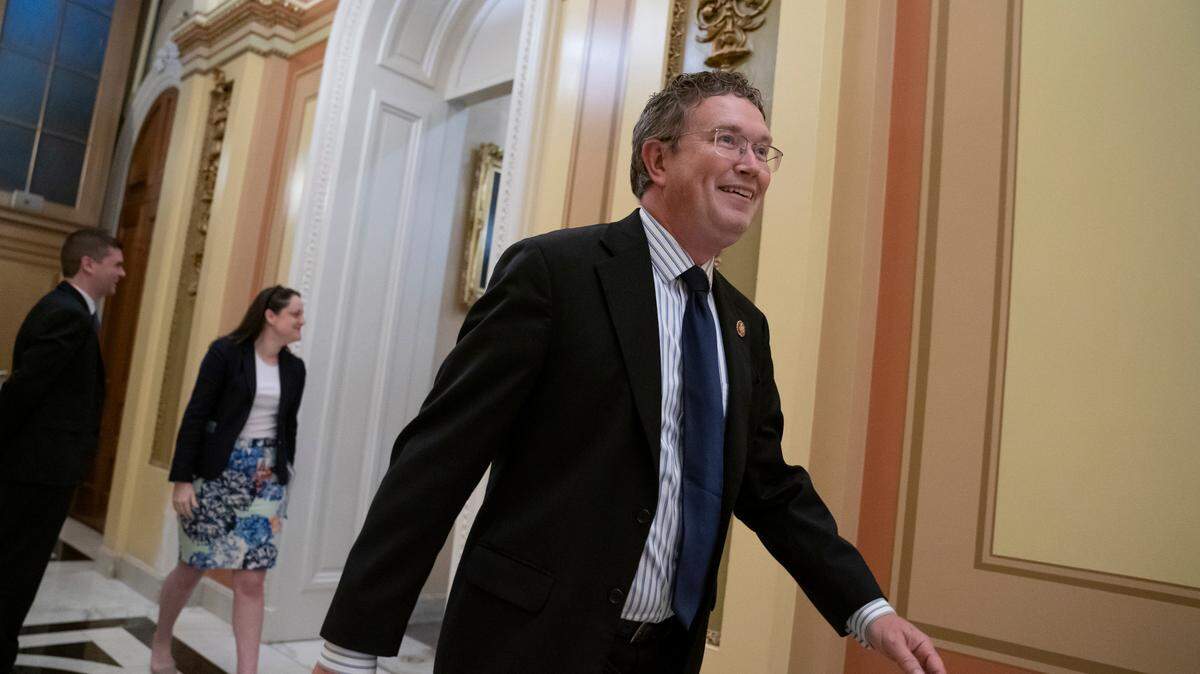 Rep. Thomas Massie, R-Ky., leaves the chamber after Rep. John Rose, R-Tenn., a freshman from Cookeville, Tenn., blocked a unanimous consent vote during a scheduled pro forma session of the House on a long-awaited $19 billion disaster aid bill in the chamber, Thursday, May 30, 2019. Massie and Rep. Chip Roy, R-Texas, have both blocked passage of the measure in the past week. (AP Photo/J. Scott Applewhite)