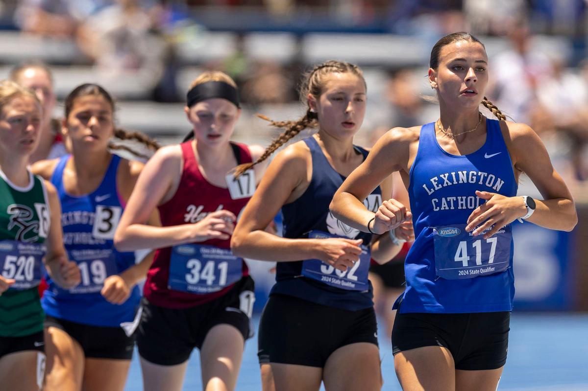 Lexington Catholic’s Cate Conklin won the 3,200 meters, finished second in the 1,600 and was part of the Knights’ winning 4-by-800 relay team Friday. “I don’t think I’ve ever been so happy to be part of a team,” she said.