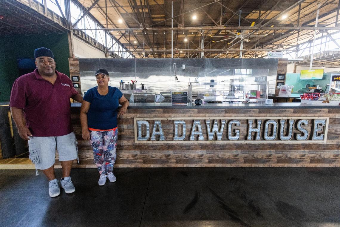 Da Dawg House business partners Darryl Clay, left, and Fern Lewis, right, at Julietta Market within Greyline Station. The food stall opened in mid July.