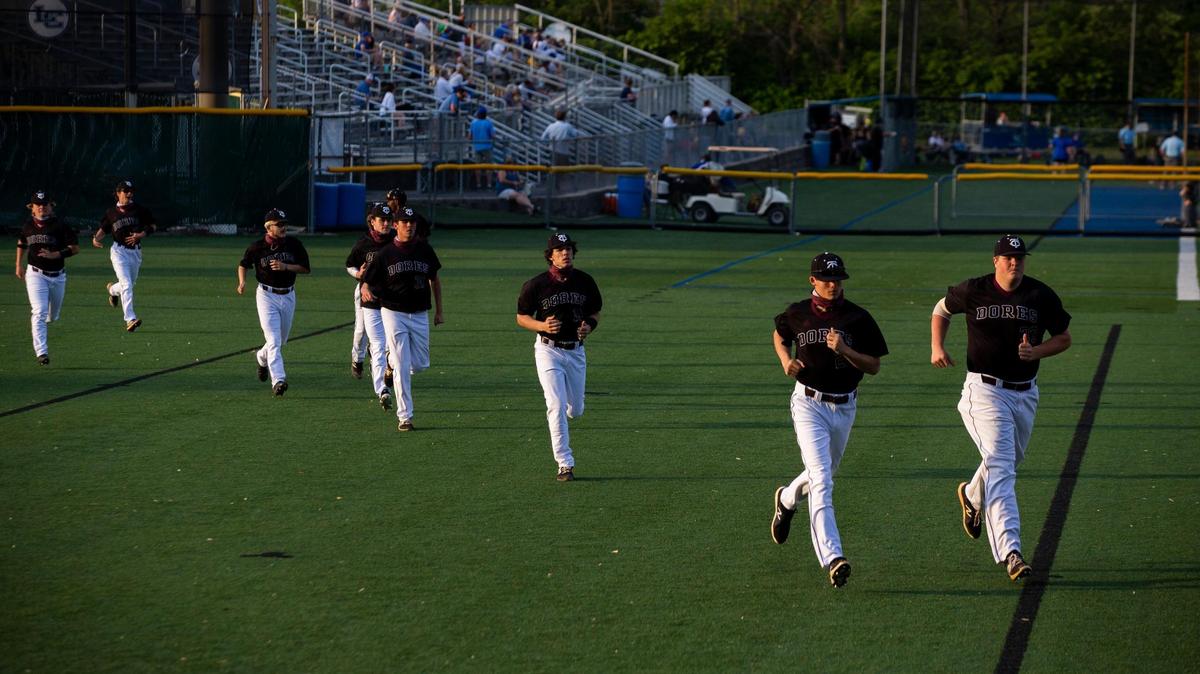 The Tates Creek Commodores warmed up before playing against the Knights at Lexington Catholic on Tuesday.