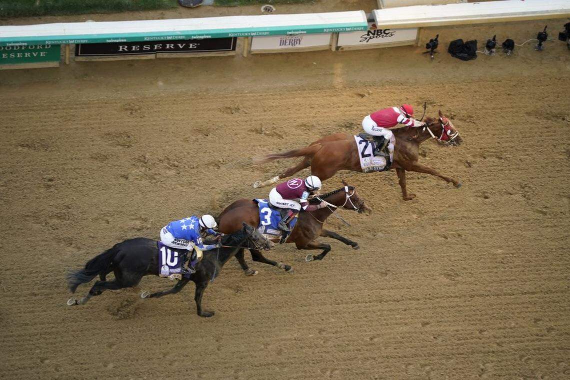 Rich Strike, with Sonny Leon aboard, surged at the finish to win the 148th running of the Kentucky Derby. Epicenter was second, followed by Zandon.