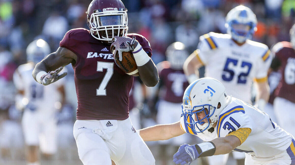 EKU running back Dy'Shawn Mobley, left, is the OVC's leading rusher this season (106 yards a game). He played for Kentucky last season and rushed for 143 yards in his final game there.    