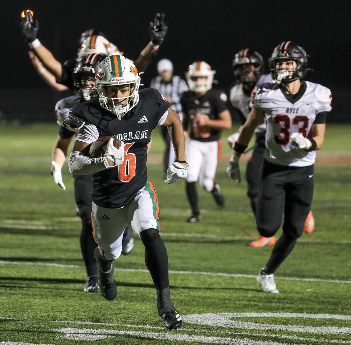 Quarter of the Ryle at Douglass high school Class 6A Region Championship football game at Frederick Douglass High School in Lexington, KY on Nov. 212025. Ryle beat Douglass 28-27 in overtime. Photo by Pablo Alcala