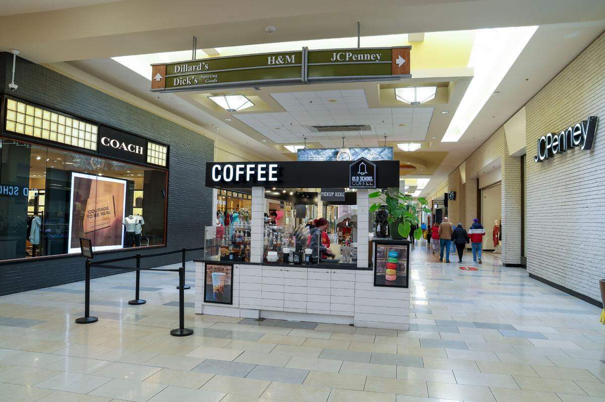 NOW: Old School Coffee kiosk, center, is surrounded by Coach and JCPenney stores in Fayette Mall, Friday, Dec. 13, 2024 in Lexington, Ky.