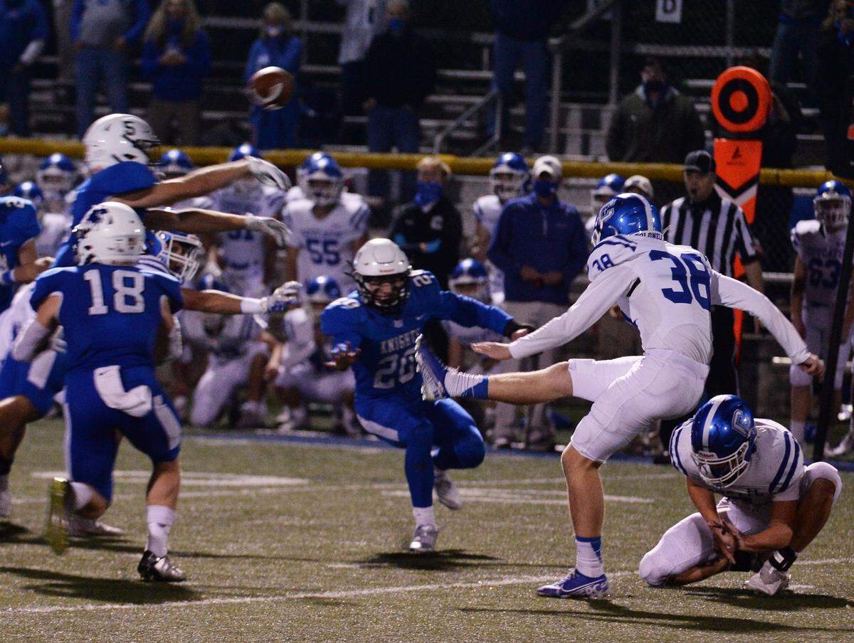 LexCath DB Jackson Klein blocks a game-winning field goal as time expires during the Lexington Catholic-Covington Catholic football game at Joseph Ford Field in Lexington, KY on Friday, November 6, 2020.