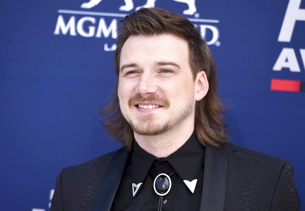 FILE - Morgan Wallen arrives at the 54th annual Academy of Country Music Awards on April 7, 2019, in Las Vegas. Wallen fans are buying up his latest album after he appeared on a video shouting a racial slur. Wallen’s sophomore record, “Dangerous: The Double Album” retains its top spot for a fourth week on Billboard’s all-genre albums chart.