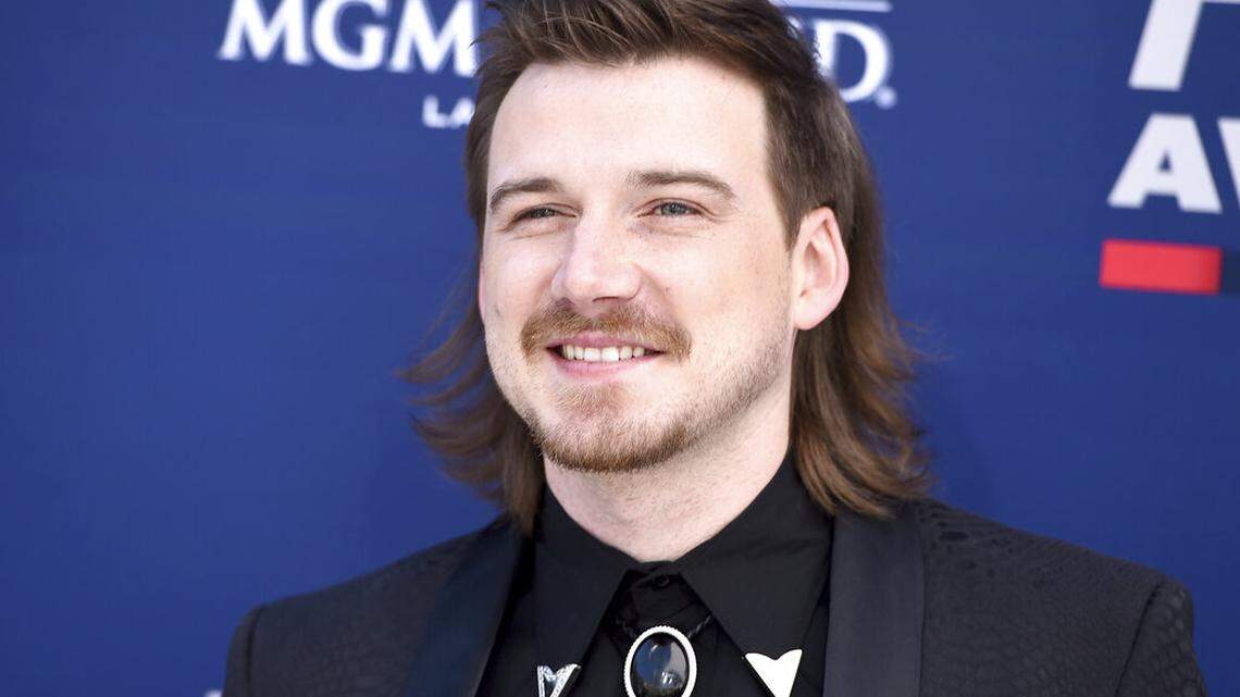 FILE - Morgan Wallen arrives at the 54th annual Academy of Country Music Awards on April 7, 2019, in Las Vegas. Wallen fans are buying up his latest album after he appeared on a video shouting a racial slur. Wallen’s sophomore record, “Dangerous: The Double Album” retains its top spot for a fourth week on Billboard’s all-genre albums chart.