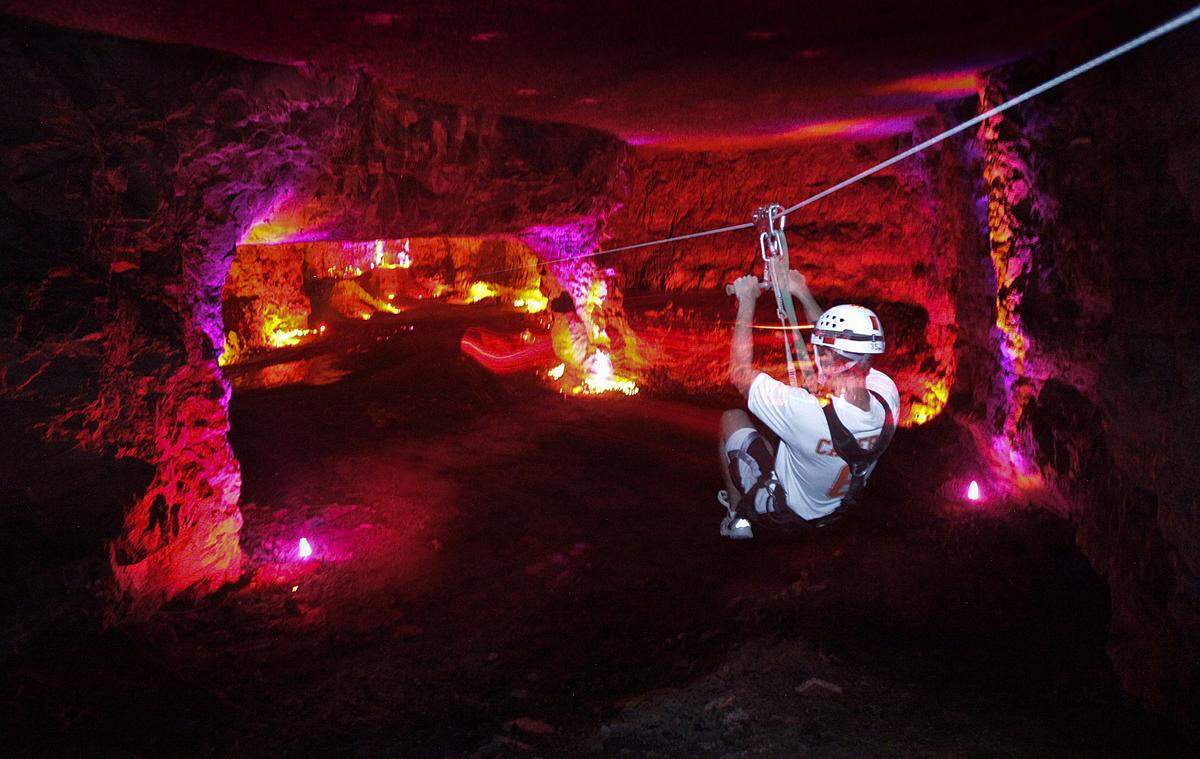 At Louisville Mega Caverns, adventurous travelers can zipline in a cave setting beneath the city.