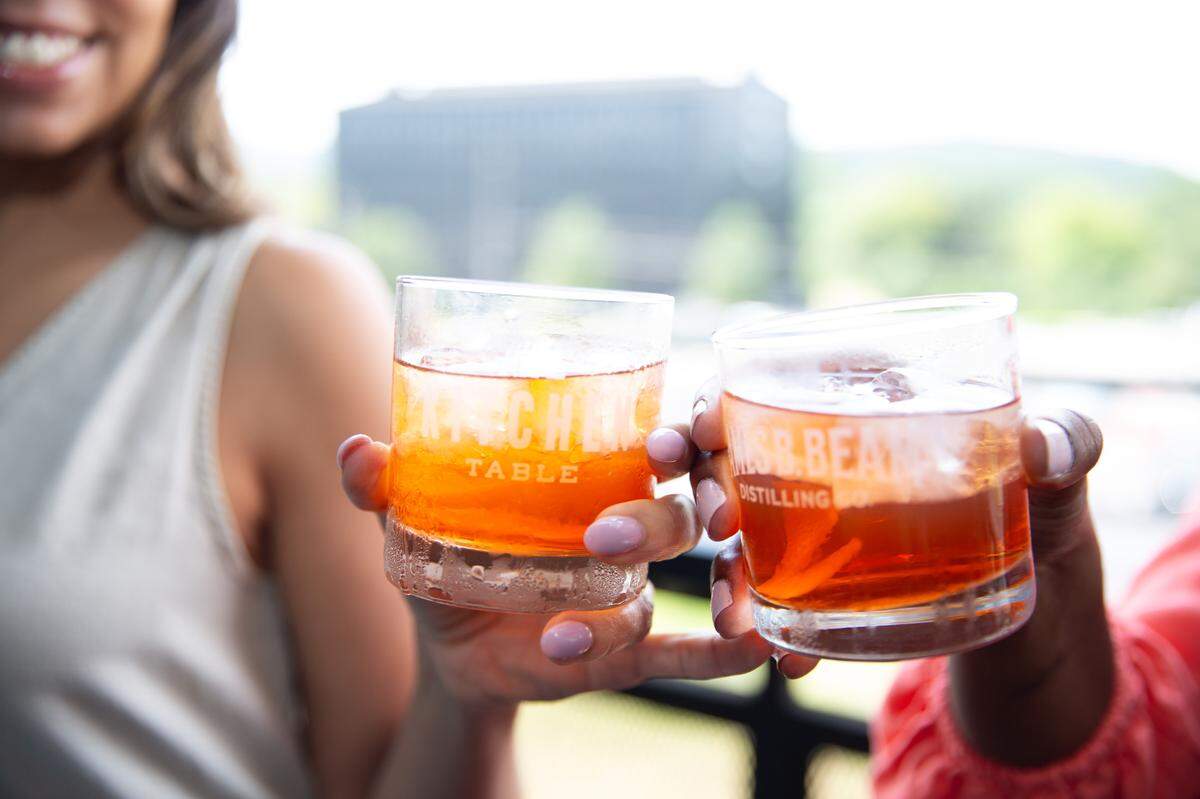 Female bourbon fans gather annually for the Bourbon Women SIPosium in Louisville to sample whiskey and share their passion for bourbon.