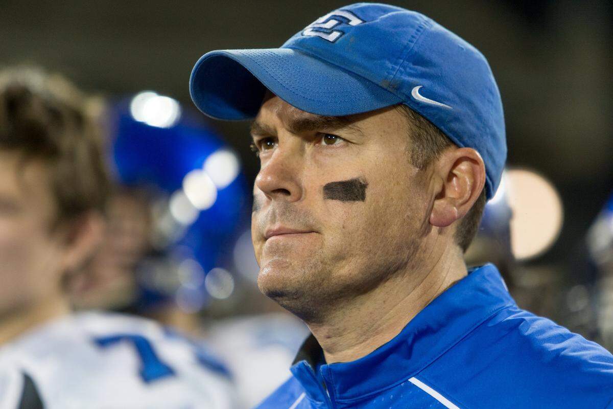 Mark Perry is a former Kentucky Wildcats quarterback and Lexington Catholic High School head coach.