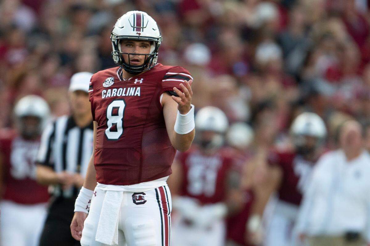 After coming to South Carolina to be a graduate assistant coach, Zeb Noland (8) wound up starting the Gamecocks’ first two games, both victories, at quarterback.