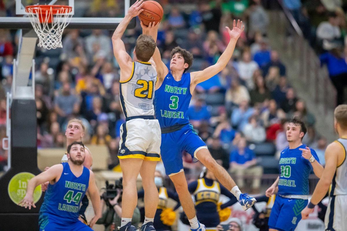North Laurel’s Reed Sheppard (3) contests a shot by Knox Central’s Isaac Mills (21) during the 13th Region championship game.