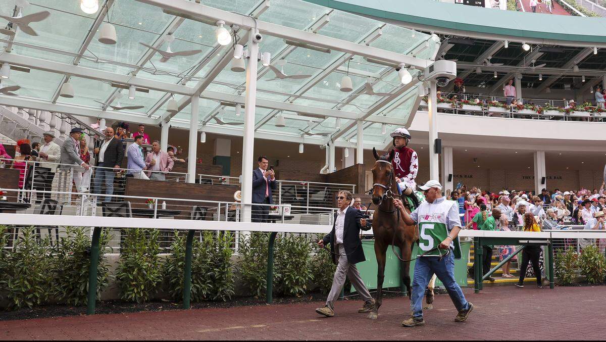 Thorpedo Anna, with Brian Hernandez Jr. up, walks in the paddock before wining the 150th Kentucky Oaks on May 3, 2024.