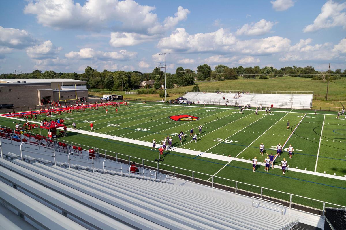 Scott County’s football team warmed up alongside players from Bowling Green ahead of the Cardinals’ first scrimmage at the new Cardinals Stadium football field on Aug. 9 at the new Scott County High School in Georgetown.