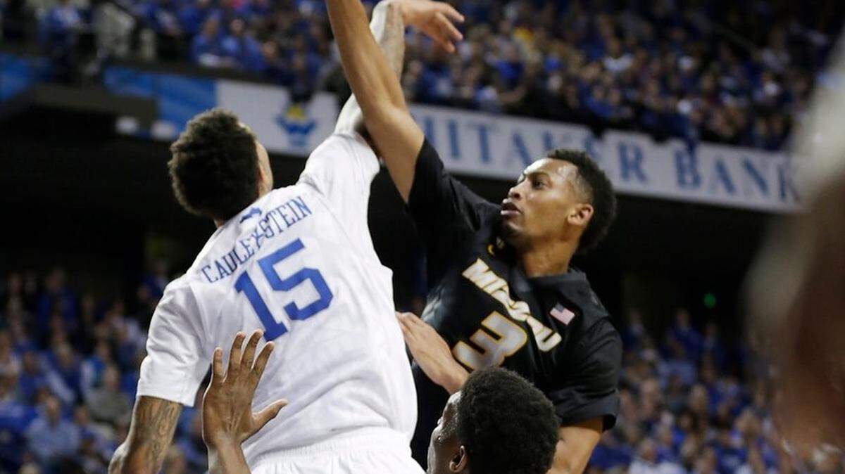 Kentucky forward Willie Cauley-Stein blocked a shot by Missouri forward Johnathan Williams III. Cauley-Stein finished with two blocks, to go with 13 points and five rebounds.