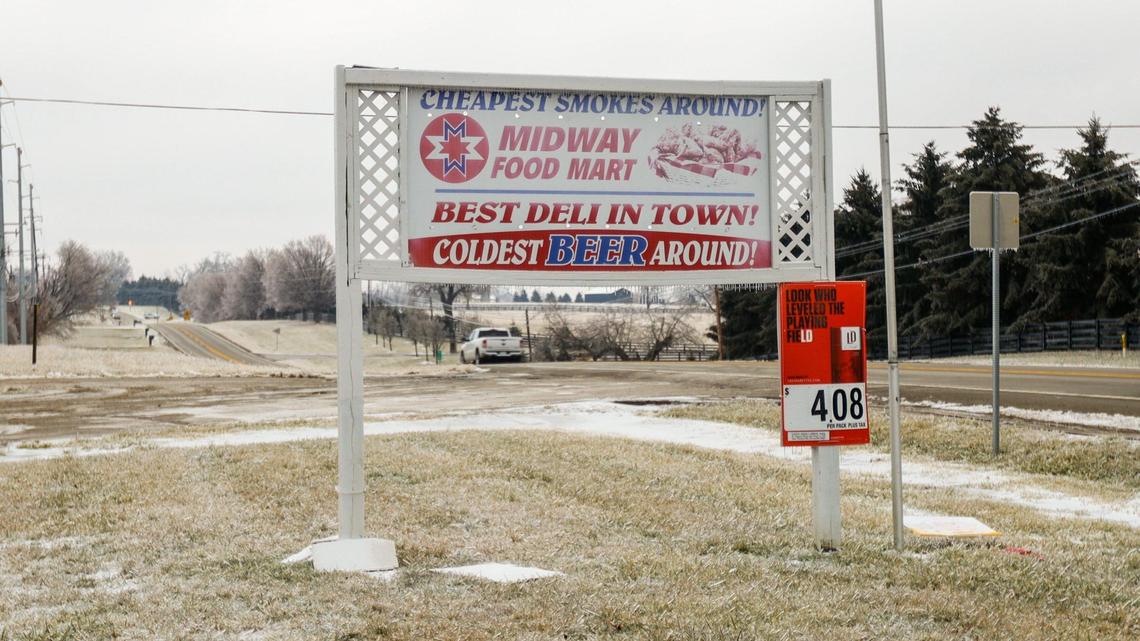 Midway Food Mart sign next to Winchester Road, Feb. 12, 2021.