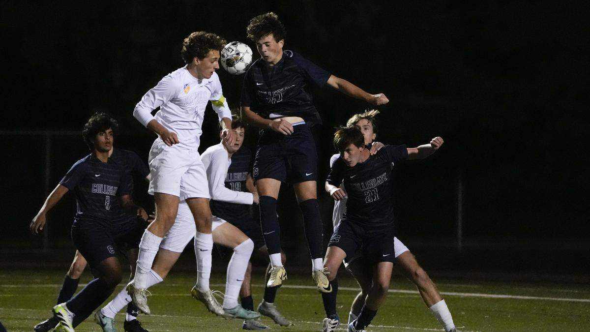 Henry Clay’s Marco Messerli (7) and Collegiate’s Carter Sipes battle for the ball during the Boys Soccer State Tournament championship game at Paul Laurence Dunbar on Nov. 2, 2024. Henry Clay won 6-1. 