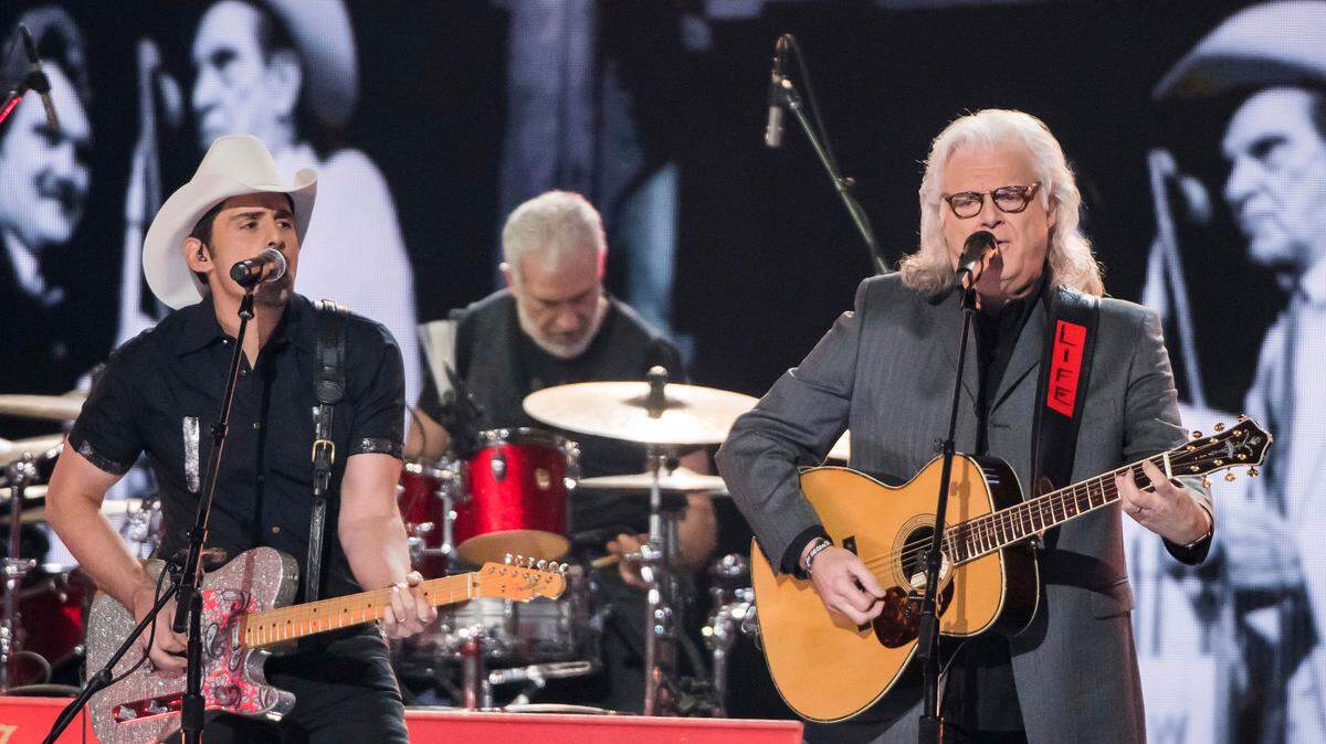 Brad Paisley, left, and Ricky Skaggs perform at the 52nd annual CMA Awards at Bridgestone Arena on Nov. 14 in Nashville.