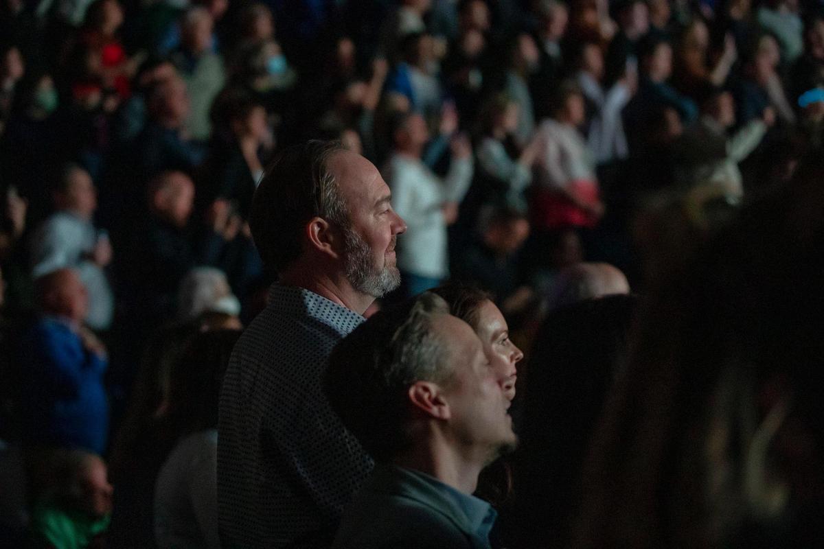Fans listen as Elton John performs at Rupp Arena in Lexington, Ky., on Saturday, April 9, 2022.