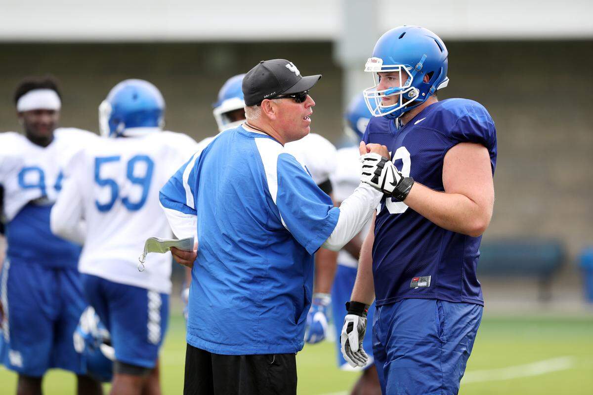 John Schlarman, a former Kentucky offensive line standout, has been on Mark Stoops’ UK staff since the beginning in 2013.