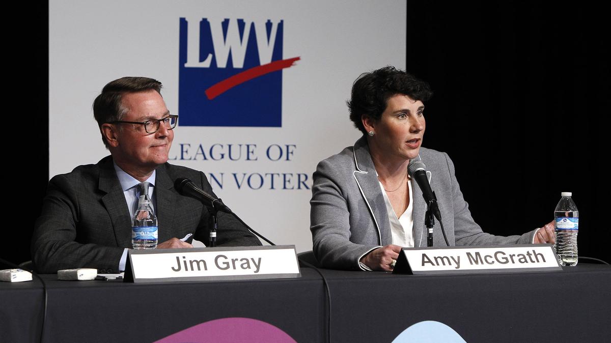 Ret. Lt. Col. Amy McGrath, right, spoke during a 6th District Congressional candidate forum. Lexington Mayor Jim Gray, left, and McGrath are contenders for the Democratic primary coming up May 22.