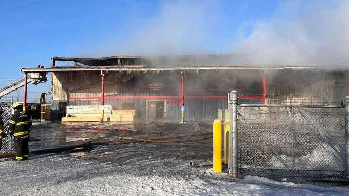The 84 Lumber on Palumbo Drive in Lexington burned in a three-alarm fire Saturday morning. Palumbo Drive and Codell Drive remained shut down as of 10 a.m.