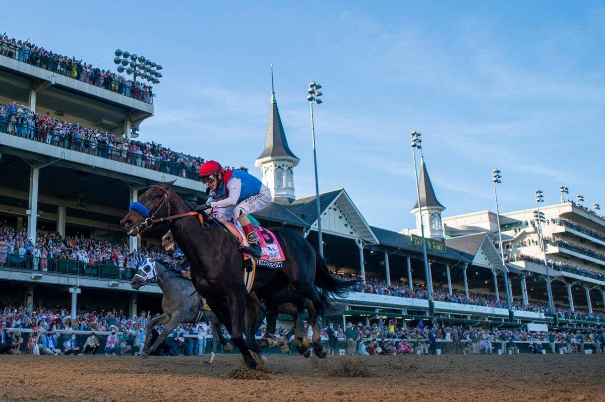 Medina Spirit (8) with John R. Velazquez up, wins the 147th Kentucky Derby on May 1, 2021, at Churchill Downs in Louisville. The 3-year-old colt died Monday after completing a workout at Santa Anita Park in California.