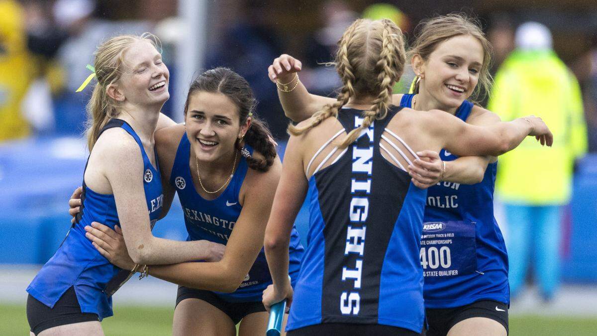 The girls 4x200 meter relay team of (L to R) Lily Knopp, Emme Peterson, Joanna Bryant and Zoe Cliburn celebrate after winning the girls 4x200 meter relay during the 2026 KHSAA Boys and Girls Class 2A State Track and Field Championships at the University of Kentucky track and field complex in Lexington, Ky., on Friday, May 22, 2026.