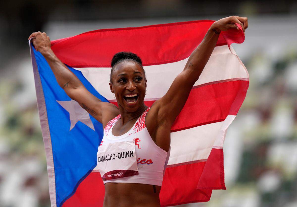 Former UK track and field star Jasmine Camacho-Quinn is Puerto Rico’s first gold medal winner in an athletics event.