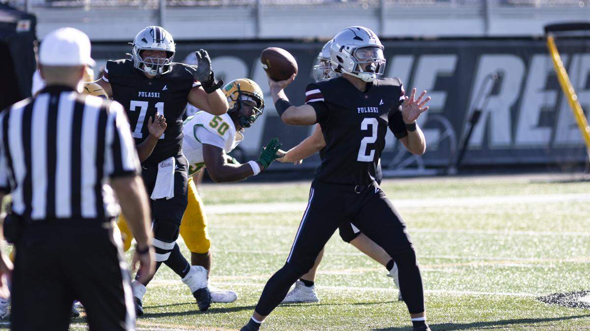 Pulaski County quarterback Zak Anderson drops back to pass in the Maroons’ 49-27 win against Bryan Station in the Rebel Bowl at Boyle County High School in Danville on Saturday.