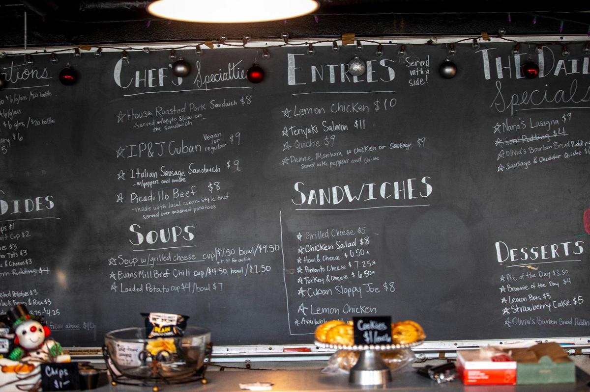 The menu is writtne on an old chalk blackboard.