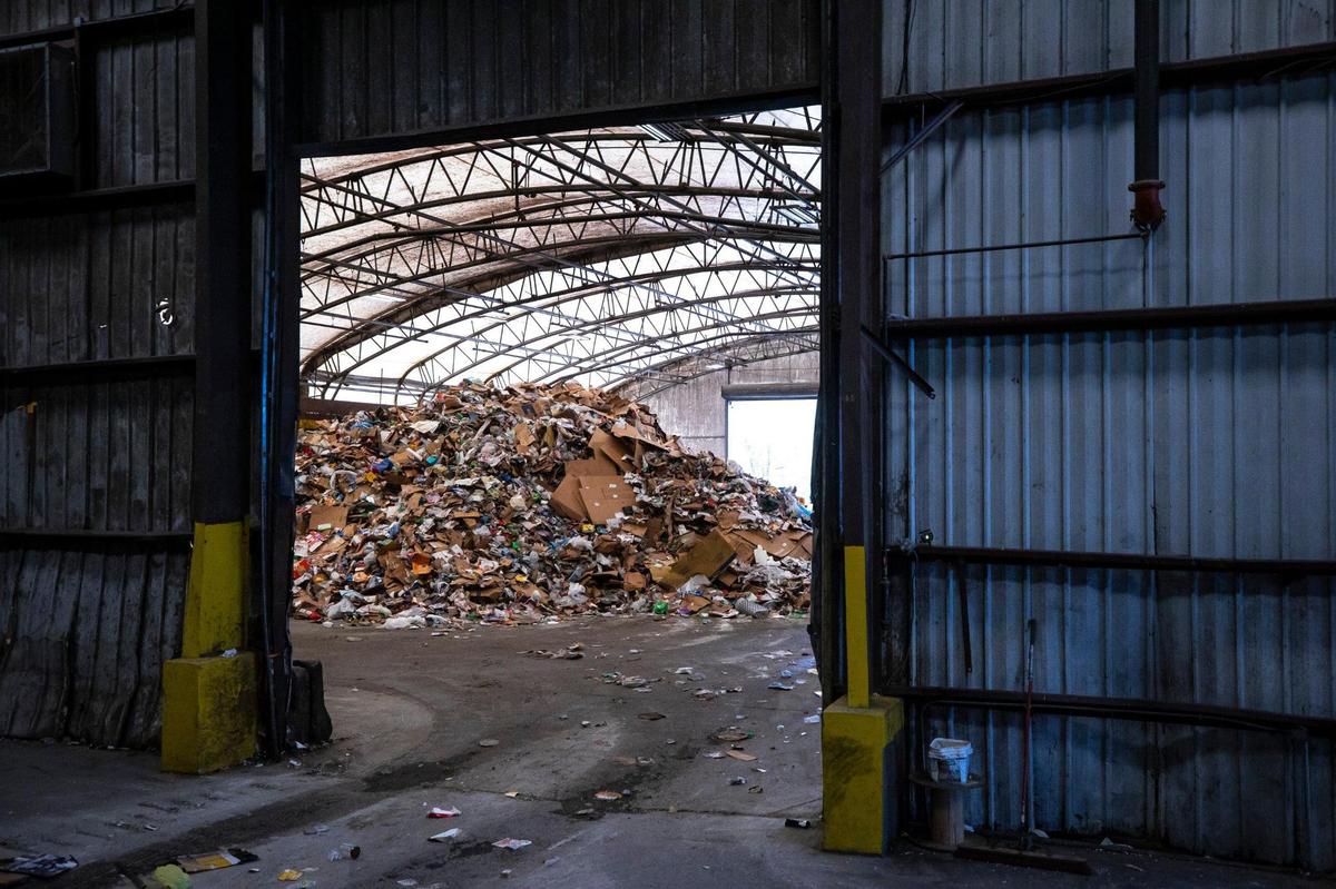 Recycling waits to be sorted at the Lexington Recycling Center in Lexington, Ky., on Thursday, April 7, 2022. Lexington began overhauling the recycling center in December to make it possible for the city to start processing paper again after suspending curbside paper recycling in May 2019.