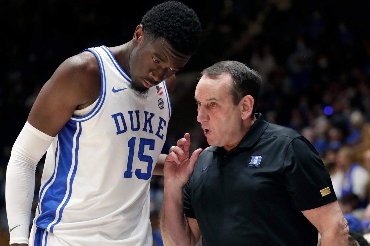 Duke center Mark Williams (15) gets direction from Blue Devils Coach Mike Krzyzewski during the Blue Devils’ 106-38 exhibition victory over Winston Salem State.