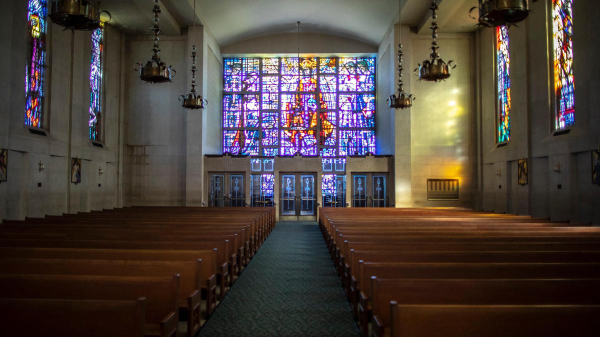 Pews were empty during a celebration of Mass at Cathedral of Christ the King in Lexington, Ky., Sunday, March 29, 2020. The church was webcasting its services in response to the coronavirus pandemic.