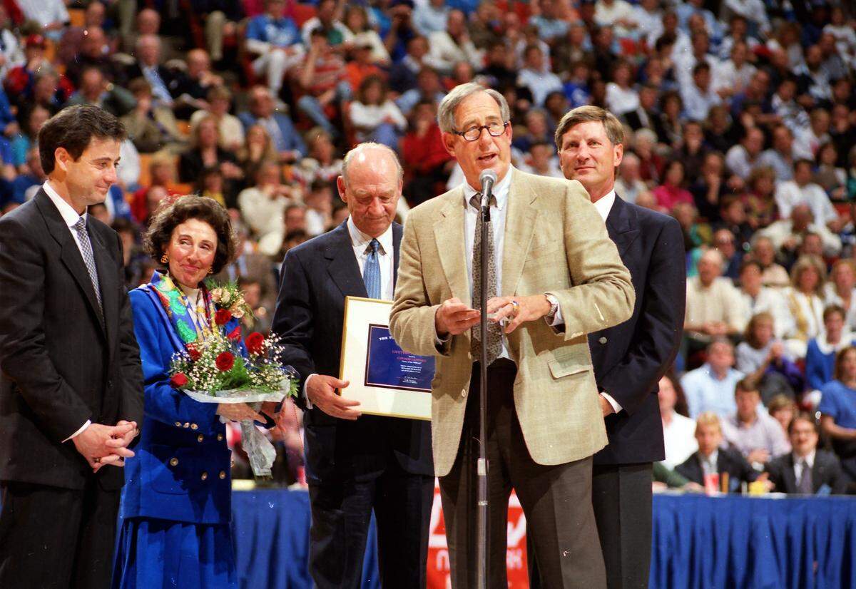 After Kentucky’s final men’s basketball home game of 1991-92, then-UK Athletics Director C.M. Newton spoke during a postgame ceremony honoring the 39-year UK broadcasting career of Cawood Ledford, center. Behind Newton and Ledford, from left, were Rick Pitino, Ledford’s wife, Frances, and Bill Curry.