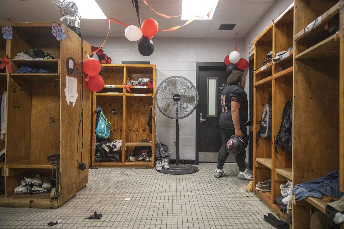 Alex Hamilton, of Harlan County, walks out of the locker room before the start of a game against Perry County Friday, Oct. 25, 2019.