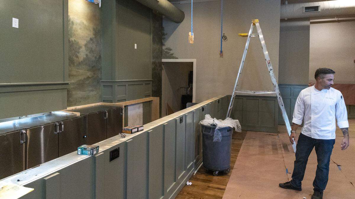 The bar area inside Millstone, a new Lexington restaurant inside historic Dudley Square, photographed Thursday, Sept. 26, 2025, in Lexington, Ky. This area was Dudley’s main dining room when the longtime popular restaurant was there until October. 31, 2009. Owner Tyler Murray said they refinished all the floors in the restaurant. 