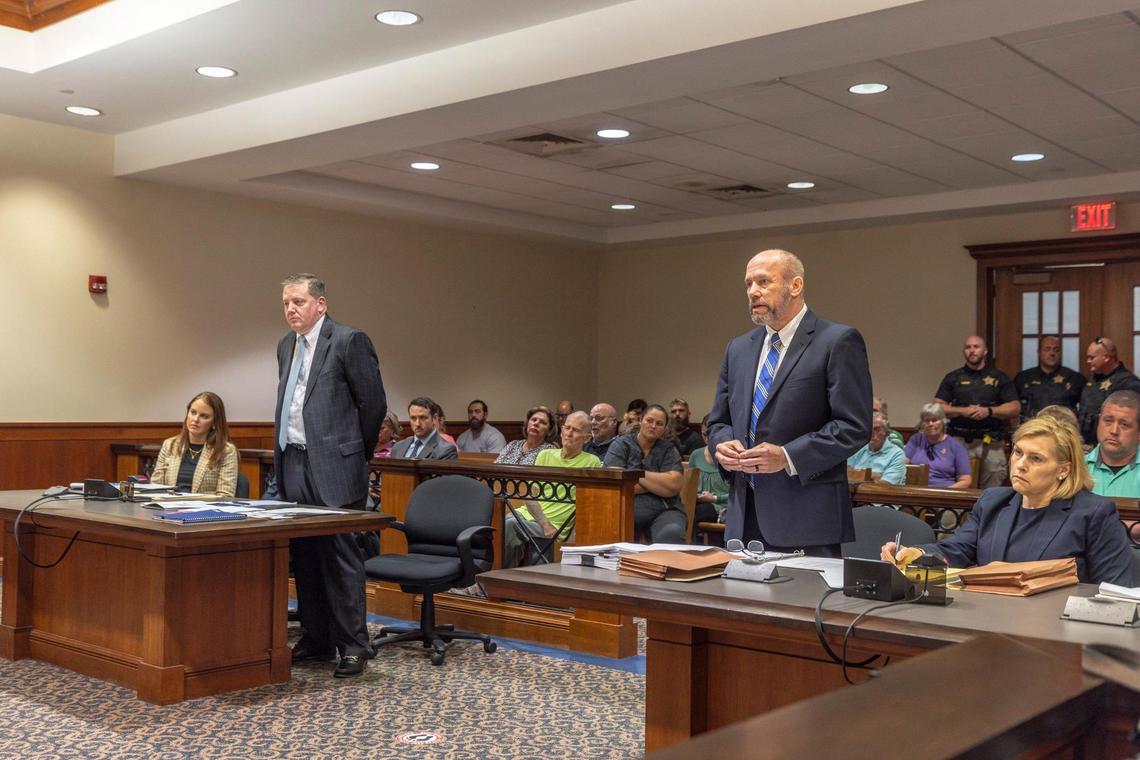 Special prosecutor Shane Young, standing, right, speaks during the arraignment for Brooks Houck at the Nelson County Courthouse in Bardstown, Ky., on Thursday, Oct. 5, 2023. Houck has been charged in the murder of Crystal Rogers.