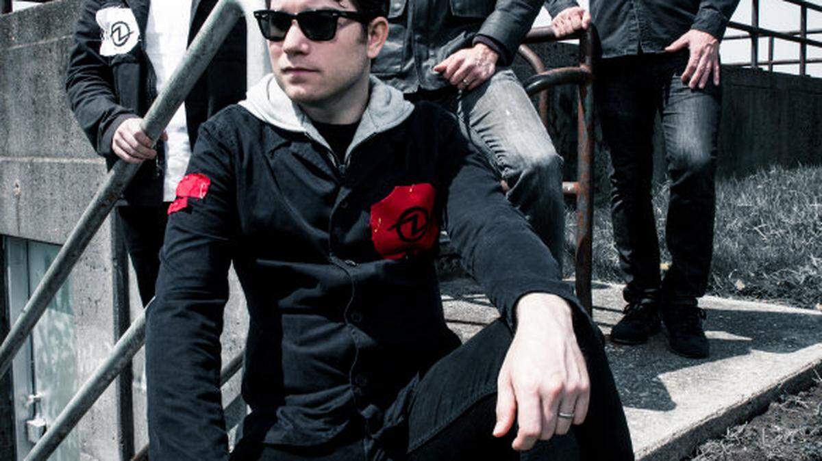 Hawthorne Heights are, from left, standing:  Matt Ridenour, Micah Carli, Eron Bucciarelli, Mark McMillon, and (front) J.T. Woodruff. 