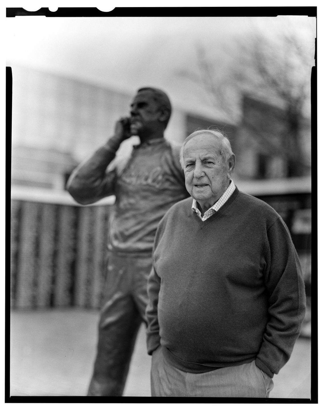 Former Eastern Kentucky football coach Roy Kidd stood in front of a statue in his honor in the north end zone, overlooking the field at Roy Kidd Stadium, on Dec. 2, 2021.