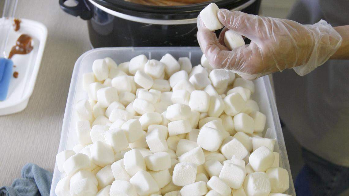 Mary Lee Valladares dipped marshmallows in caramel to make the famous Modjeska candy.
