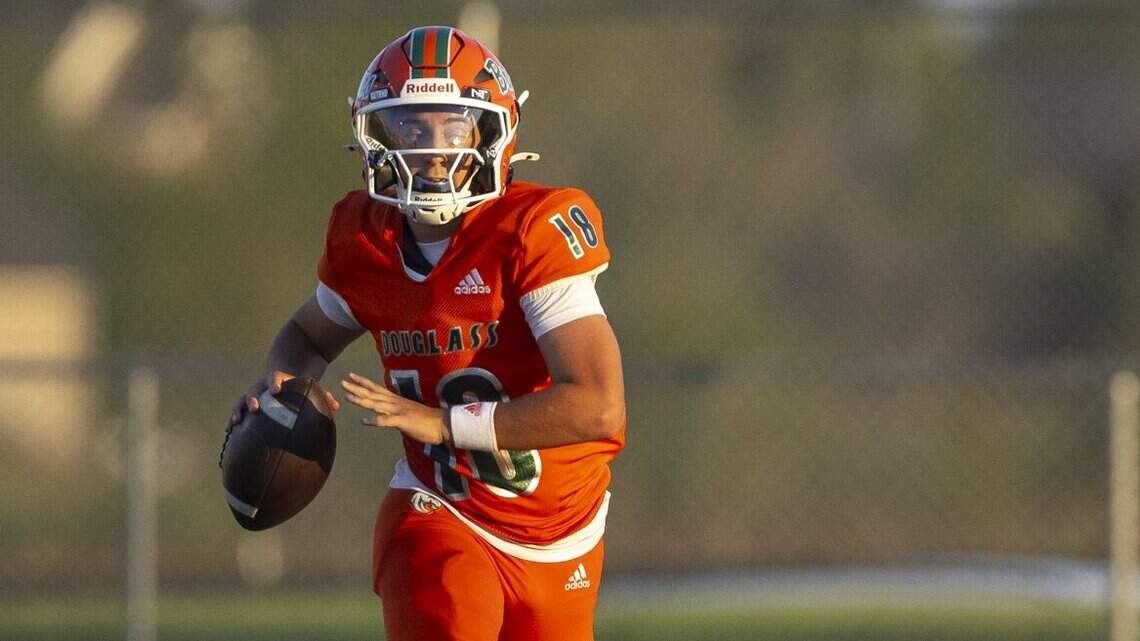‘He’s going to cut it loose.’ Douglass sophomore QB takes it one pass at a time
